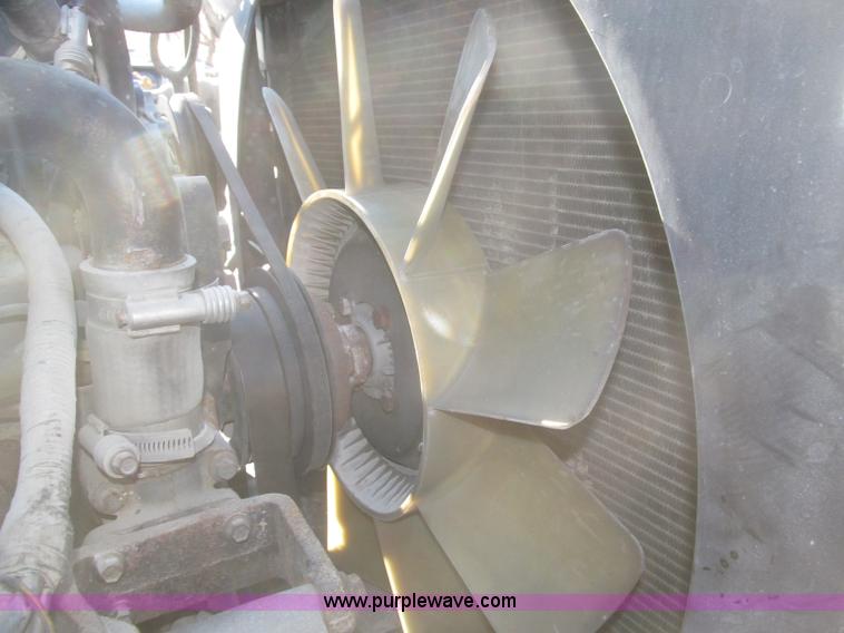 image for item F7252 1997 Ford L8501 Louisville 20' flatbed truck with lift gate