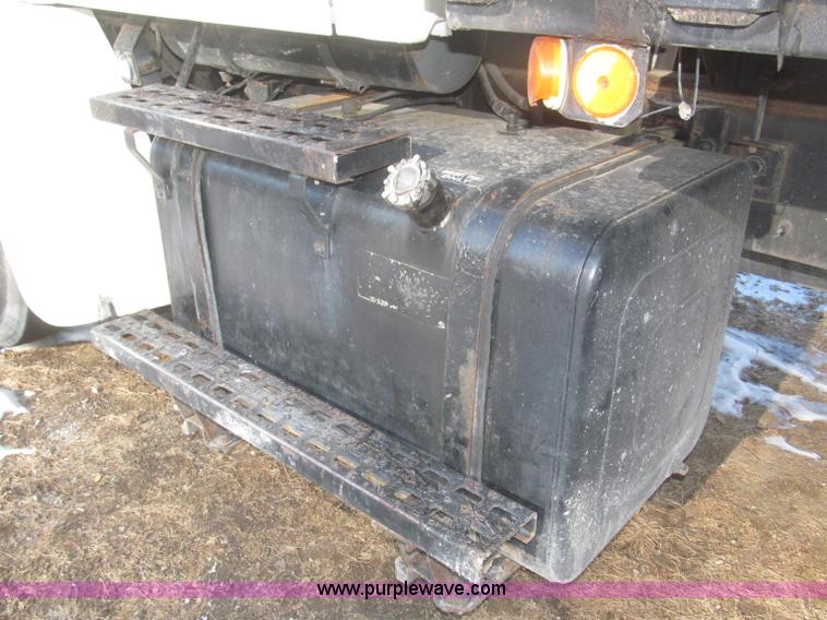 image for item F7252 1997 Ford L8501 Louisville 20' flatbed truck with lift gate