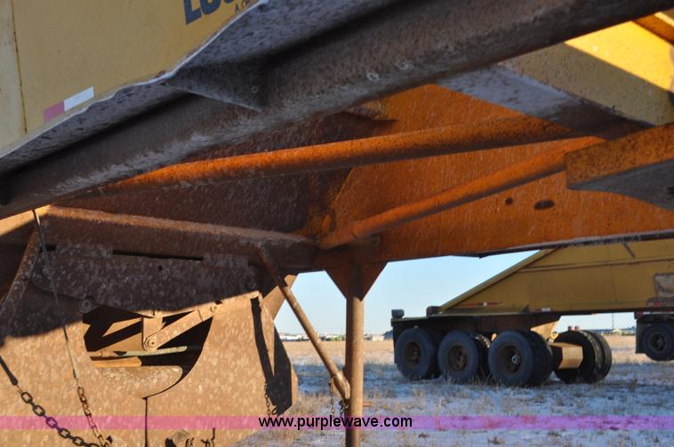 image for item G6404 1972 Load King triple axle belly dump trailer