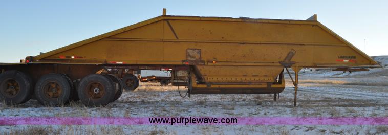 image for item G6405 1972 Load King triple axle belly dump trailer