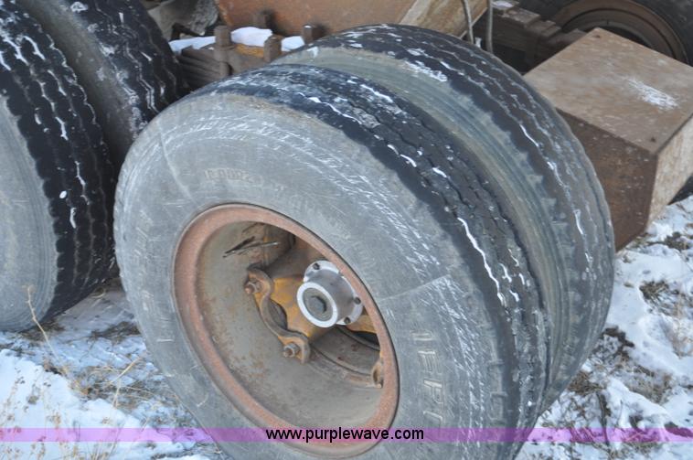 image for item G6405 1972 Load King triple axle belly dump trailer