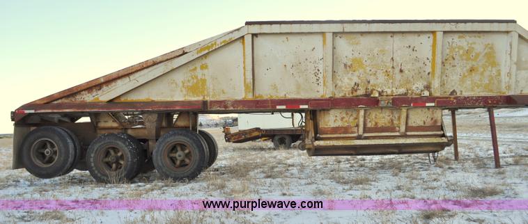 image for item G6406 1973 Fruehauf triple axle belly dump trailer