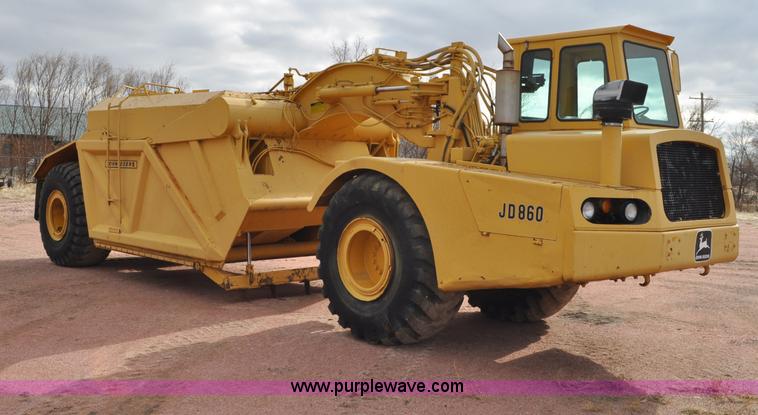 image for item G6420 John Deere 860 water wagon