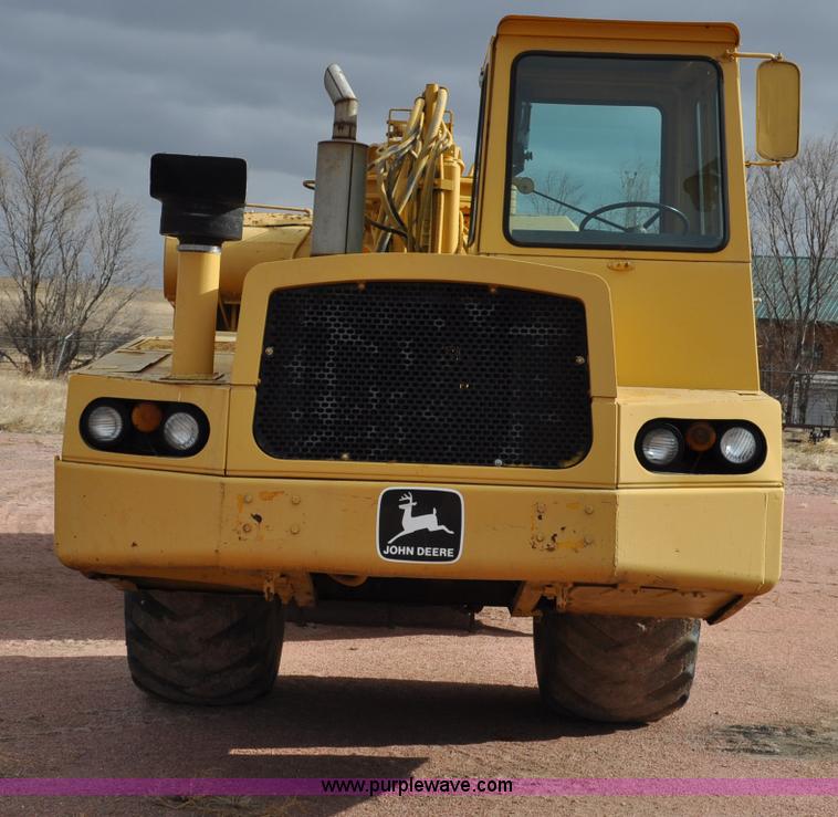 image for item G6420 John Deere 860 water wagon
