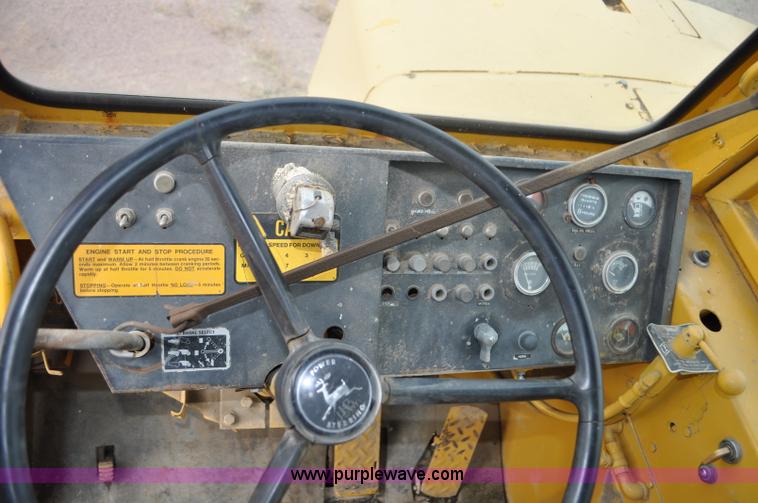 image for item G6420 John Deere 860 water wagon