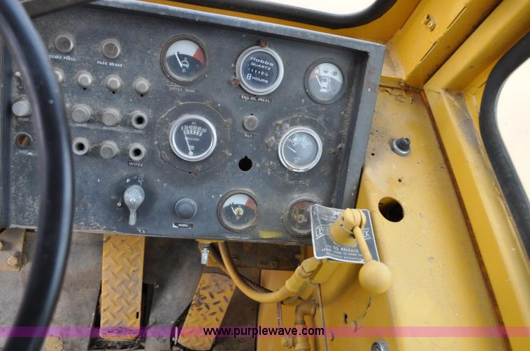 image for item G6420 John Deere 860 water wagon