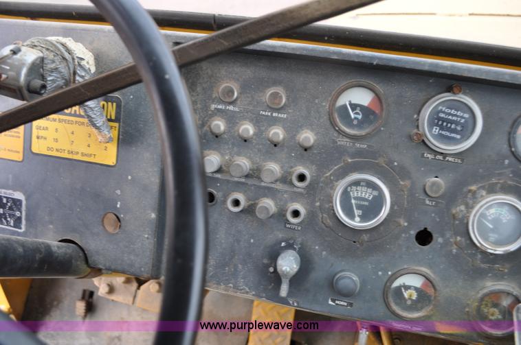 image for item G6420 John Deere 860 water wagon