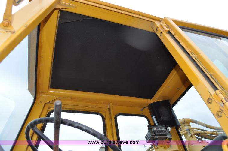 image for item G6420 John Deere 860 water wagon