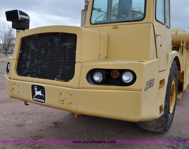 image for item G6420 John Deere 860 water wagon