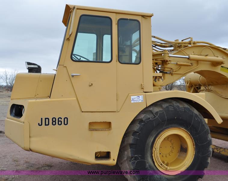 image for item G6420 John Deere 860 water wagon