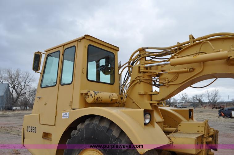 image for item G6420 John Deere 860 water wagon