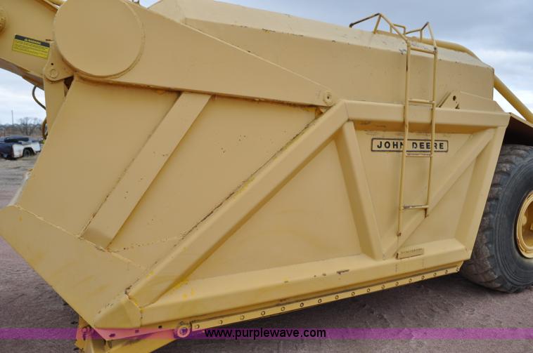 image for item G6420 John Deere 860 water wagon