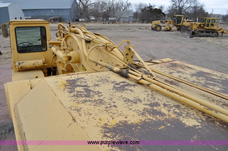 image for item G6420 John Deere 860 water wagon