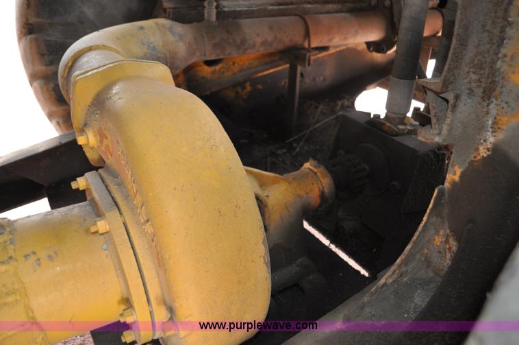image for item G6420 John Deere 860 water wagon