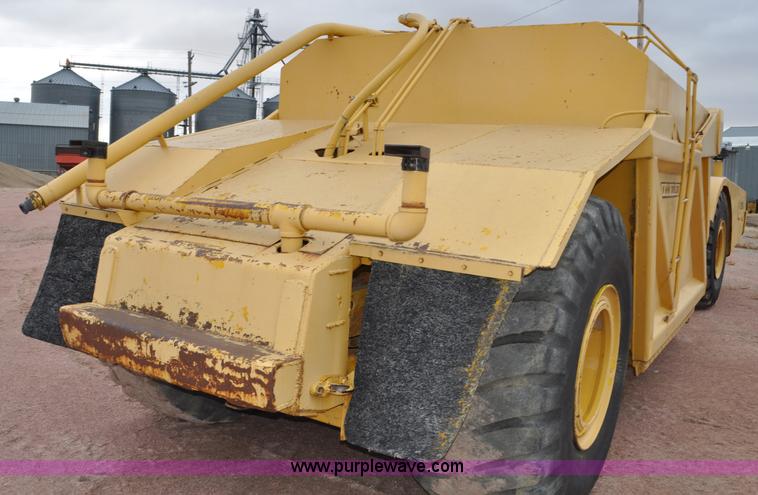 image for item G6420 John Deere 860 water wagon