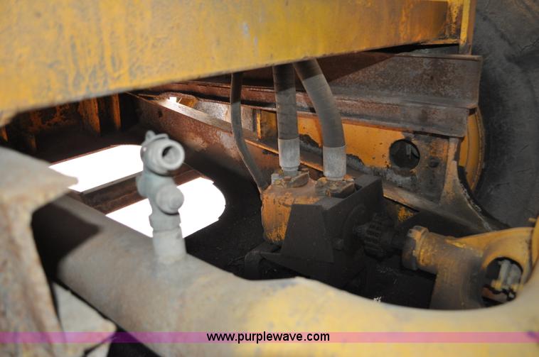 image for item G6420 John Deere 860 water wagon