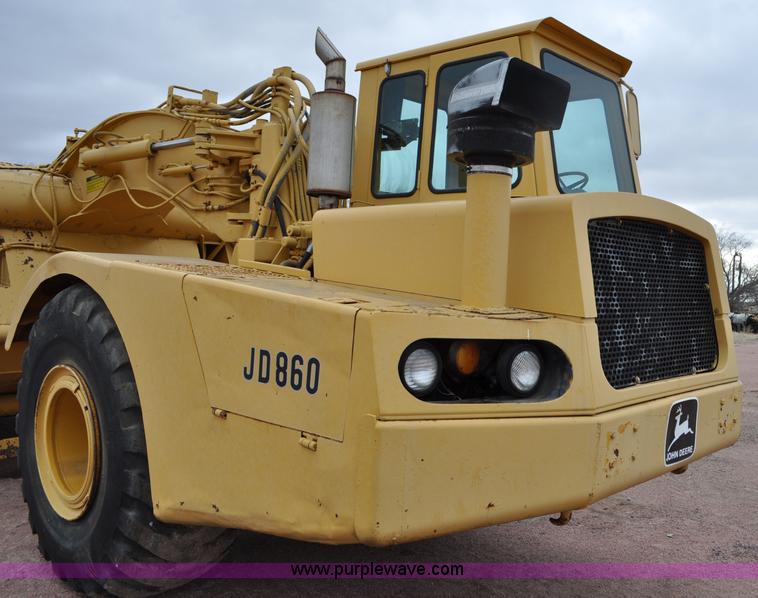 image for item G6420 John Deere 860 water wagon