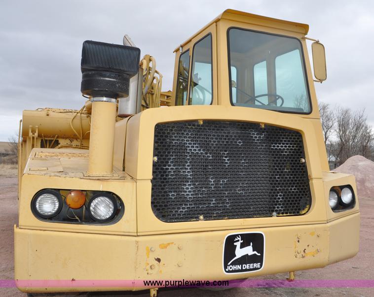image for item G6420 John Deere 860 water wagon