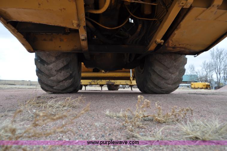image for item G6420 John Deere 860 water wagon