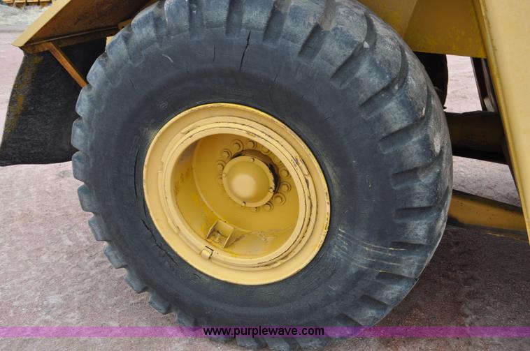 image for item G6420 John Deere 860 water wagon