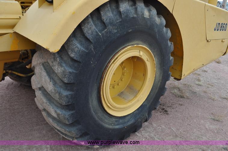 image for item G6420 John Deere 860 water wagon