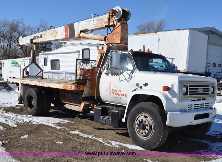 image for item G6421 1988 Chevrolet 7000 flatbed truck with crane