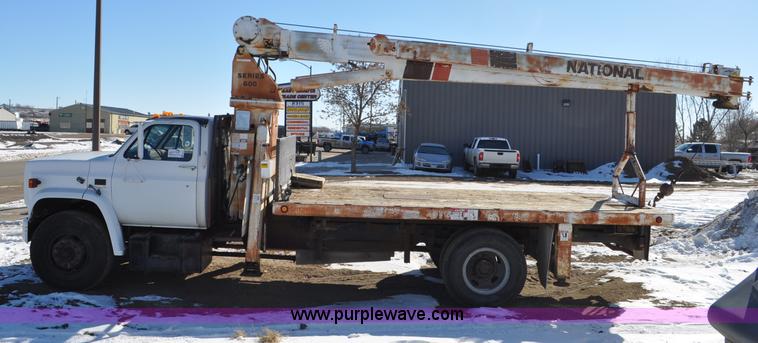 image for item G6421 1988 Chevrolet 7000 flatbed truck with crane