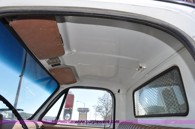 image for item G6421 1988 Chevrolet 7000 flatbed truck with crane