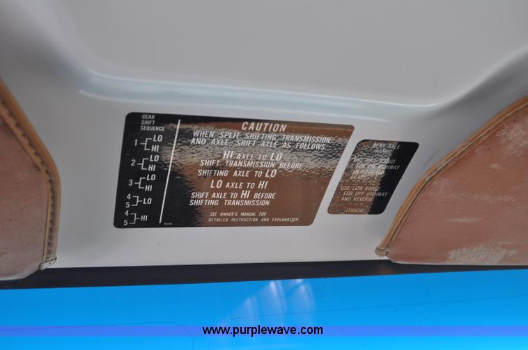 image for item G6421 1988 Chevrolet 7000 flatbed truck with crane