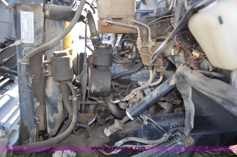 image for item G6421 1988 Chevrolet 7000 flatbed truck with crane