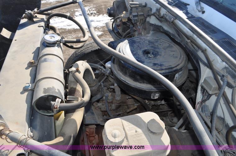 image for item G6421 1988 Chevrolet 7000 flatbed truck with crane