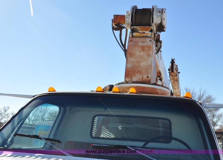 image for item G6421 1988 Chevrolet 7000 flatbed truck with crane