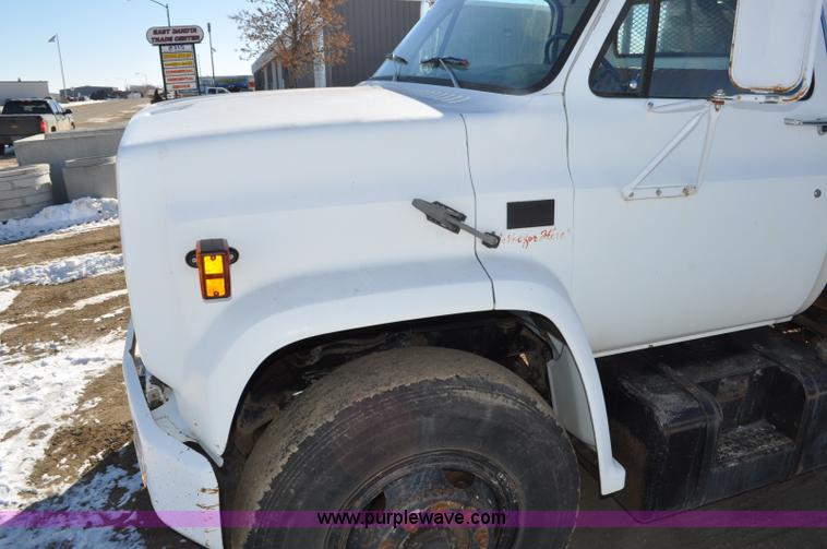 image for item G6421 1988 Chevrolet 7000 flatbed truck with crane