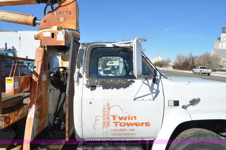 image for item G6421 1988 Chevrolet 7000 flatbed truck with crane