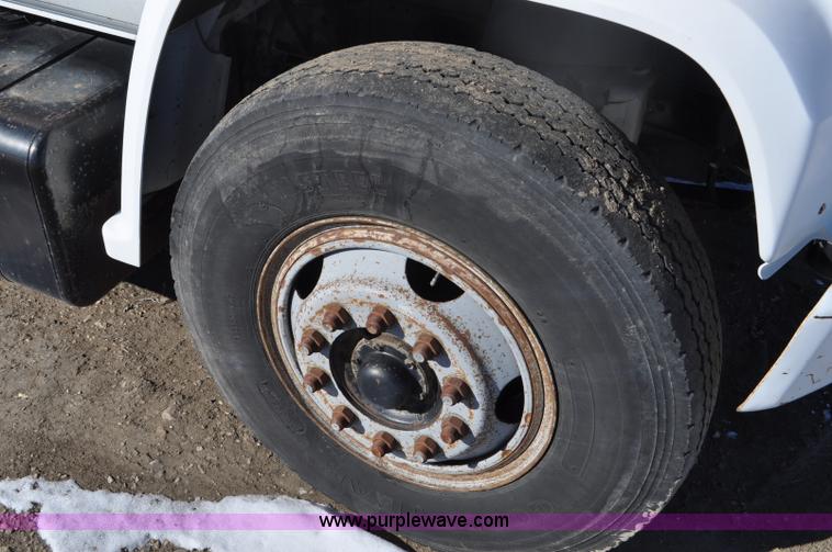 image for item G6421 1988 Chevrolet 7000 flatbed truck with crane