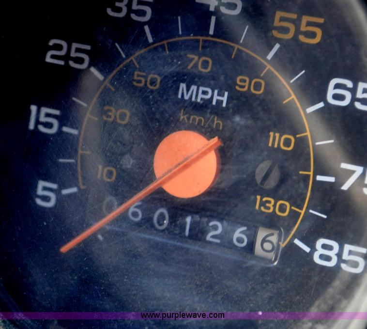 image for item G6421 1988 Chevrolet 7000 flatbed truck with crane