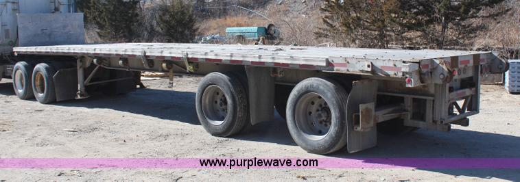 image for item H7798 1978 Raven aluminum flatbed trailer
