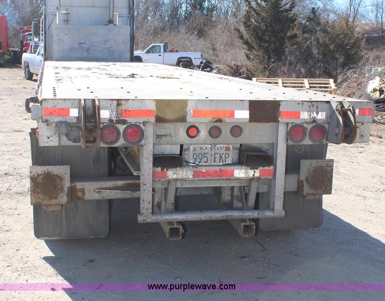 image for item H7798 1978 Raven aluminum flatbed trailer
