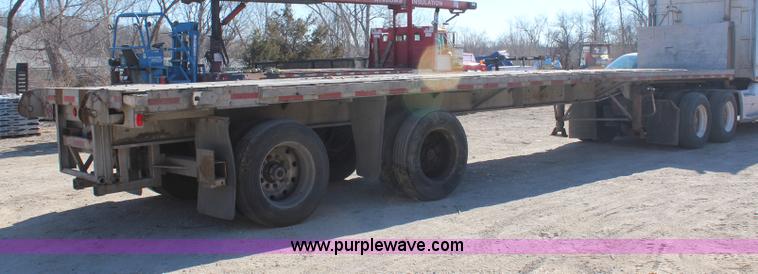 image for item H7798 1978 Raven aluminum flatbed trailer