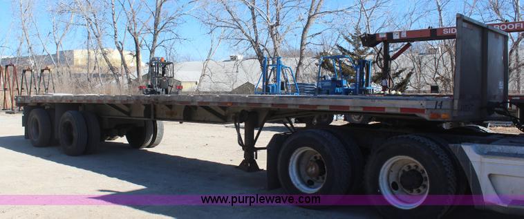 image for item H7798 1978 Raven aluminum flatbed trailer