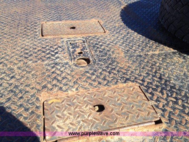 image for item C1853 1999 Ford F350 flatbed pickup truck