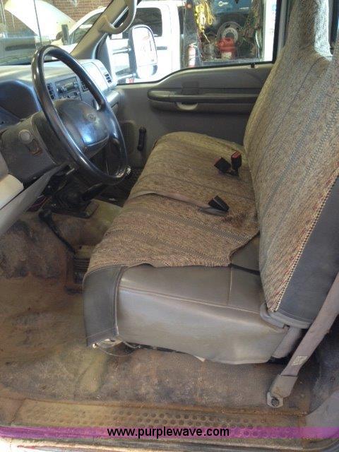 image for item C1853 1999 Ford F350 flatbed pickup truck