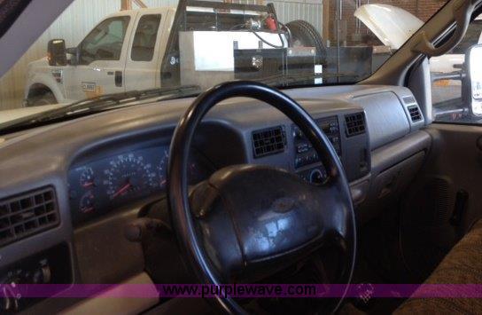 image for item C1853 1999 Ford F350 flatbed pickup truck