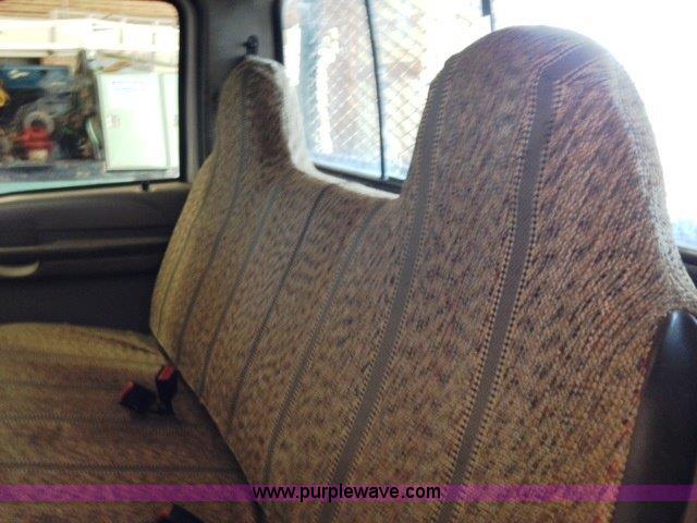 image for item C1853 1999 Ford F350 flatbed pickup truck