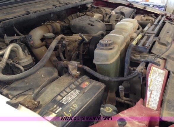 image for item C1853 1999 Ford F350 flatbed pickup truck