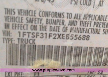 image for item C1853 1999 Ford F350 flatbed pickup truck