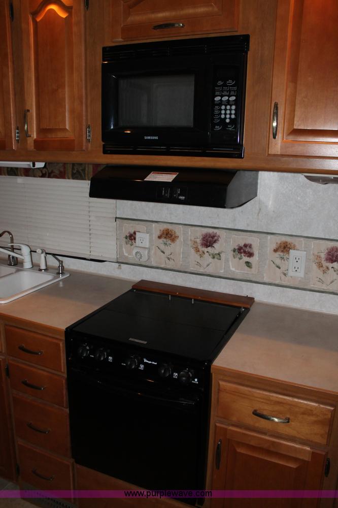 image for item C3759 2004 Fleetwood 36.5' RV fifth wheel trailer