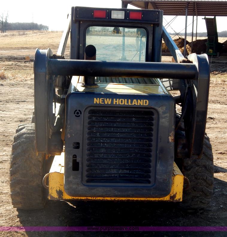 image for item G9351 New Holland L180 skid steer