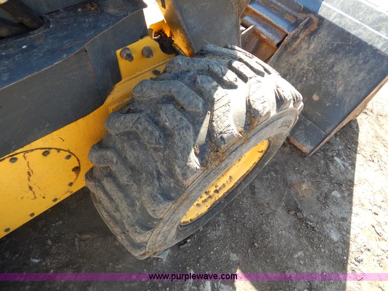 image for item G9351 New Holland L180 skid steer