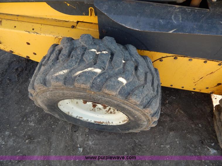 image for item G9351 New Holland L180 skid steer